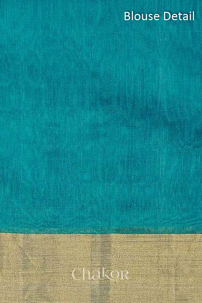 Chakor's Peacock Blue Handloom Silk Cotton Saree with woven pailsey buttis in zari.