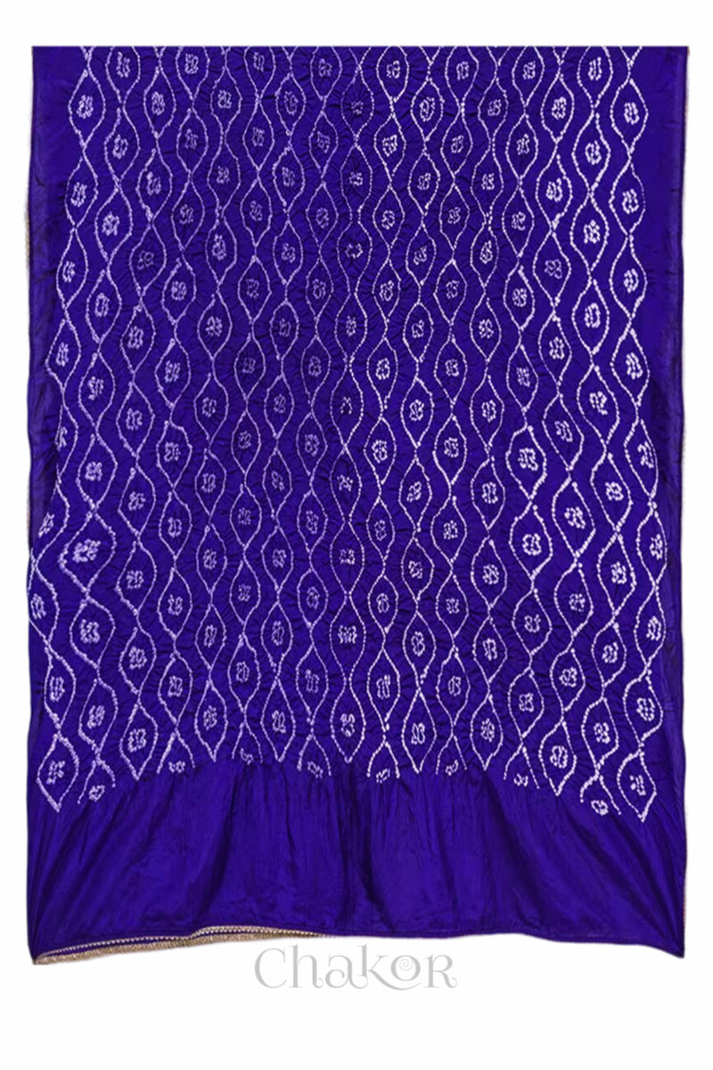 Full View of purple Bandhani mulberry silk dupatta with tie-dye dot pattern & detailed with golden lace.