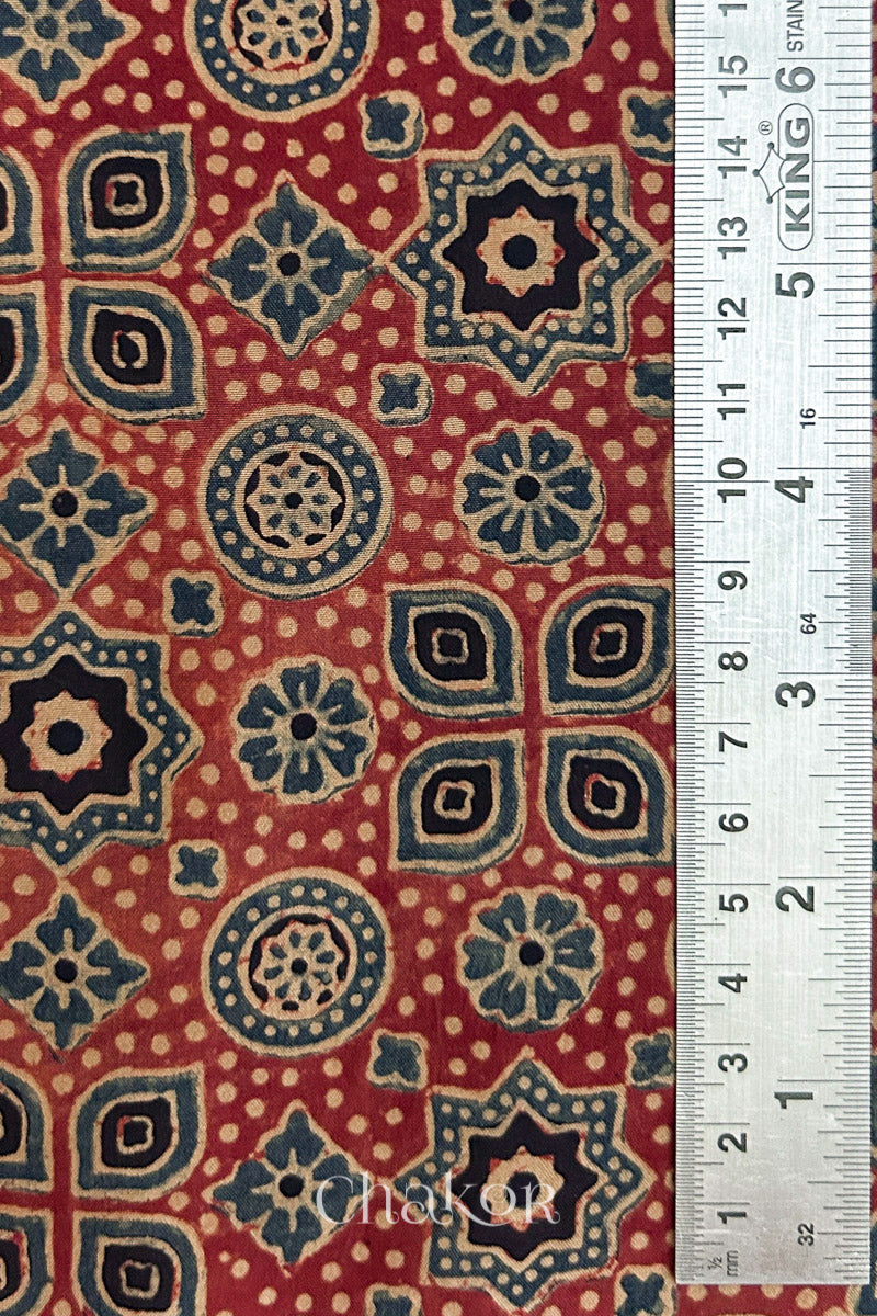 Measurement view showing motif size of pure mulberry silk fabric with Ajrakh block print in natural dyes.