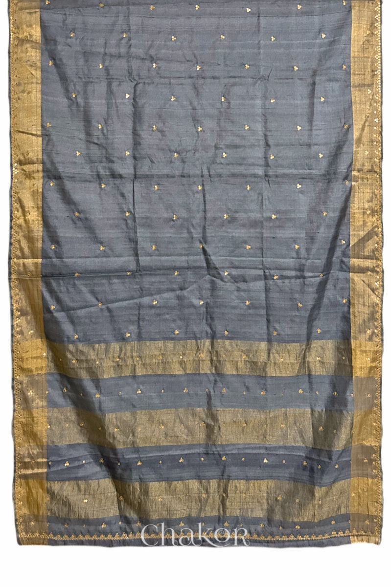Grey tussar silk handloom saree with golden zari border & hand embroidered with sequins & zari work