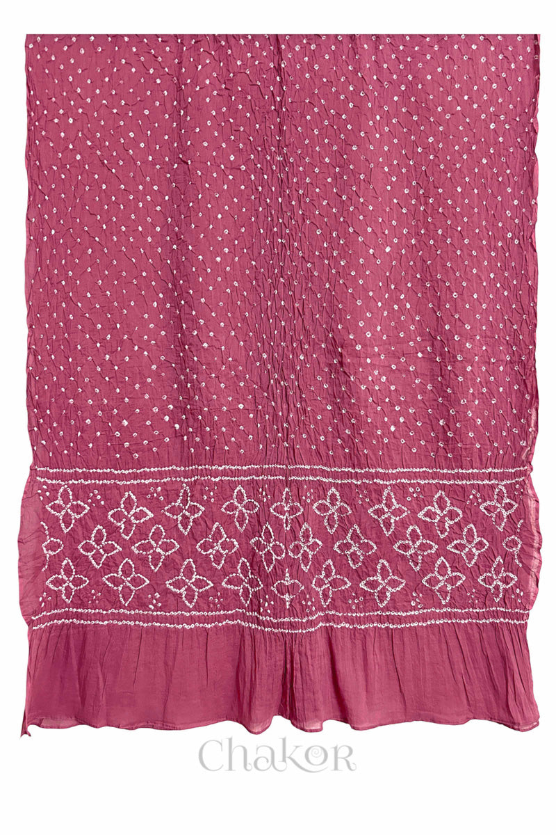 Full view of Rose Pink Bandhani mulmul cotton dupatta with floral pallu and dotted body pattern.