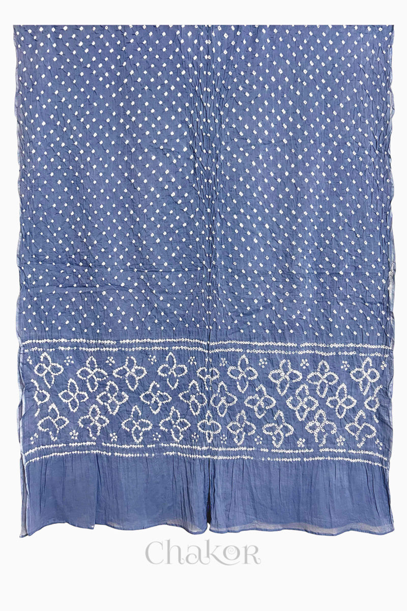 Full view of Grey Bandhani mulmul cotton dupatta with floral pallu and dotted body pattern.