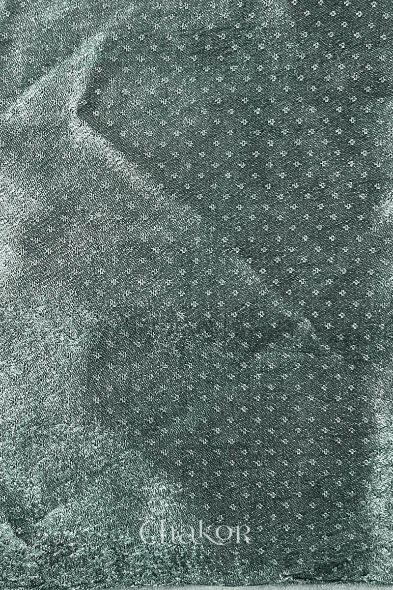 Charcoal grey mashru self textured fabric with 'Chakor' logo visible.