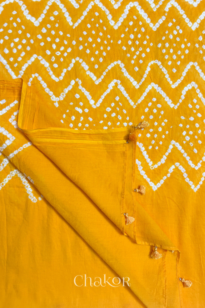 Handcrafted tassel finishing on Kutch Bandhani mulmul cotton dupatta.