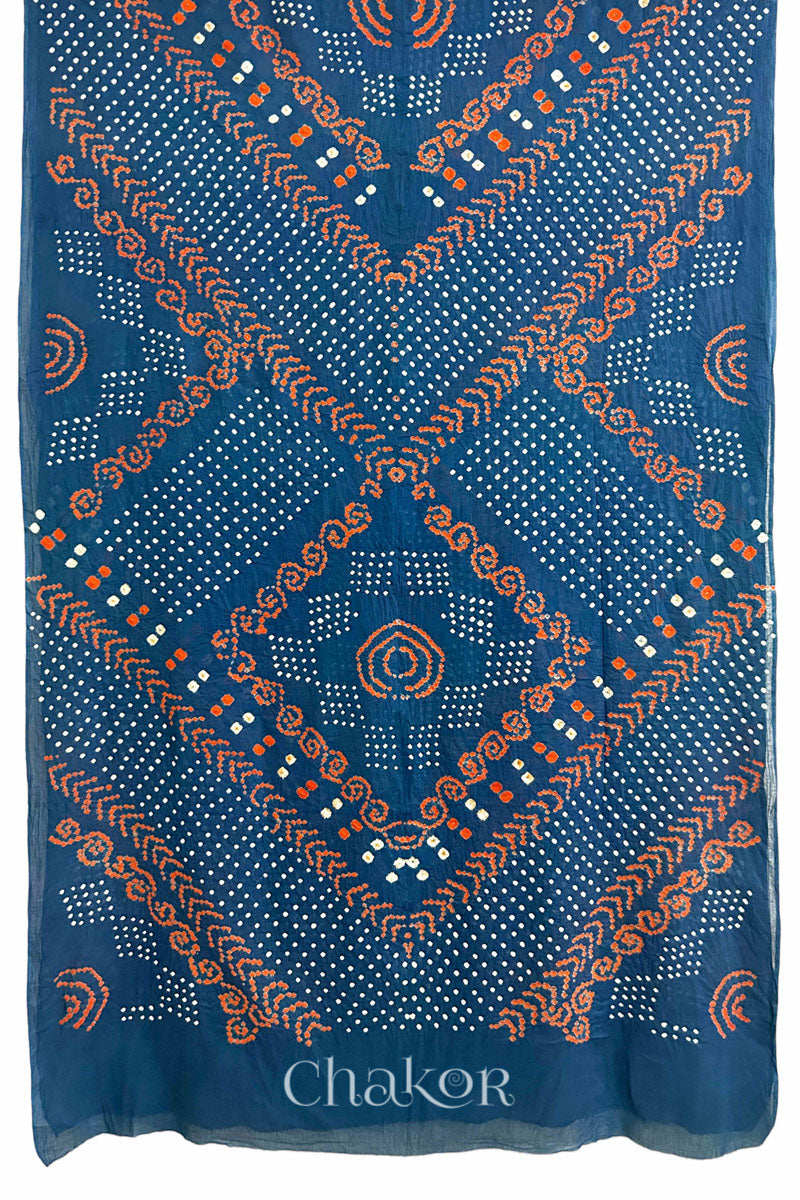 Full View: Handmade Bandhani Cotton Saree with Soft Orange and White Dots in Earthy Indgio Blue by Chakor.
