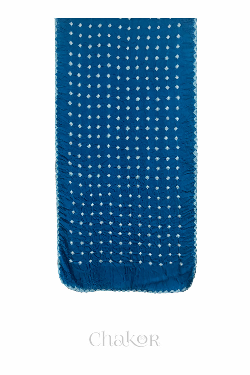Flat view of indigo Bandhani modal stole showing evenly spaced tie-dye pattern.