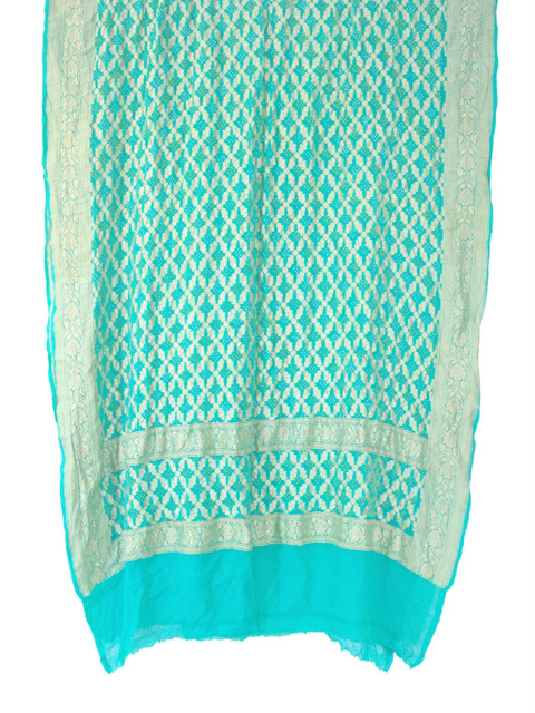 Turquoise and golden bandhani dupatta on a white background.