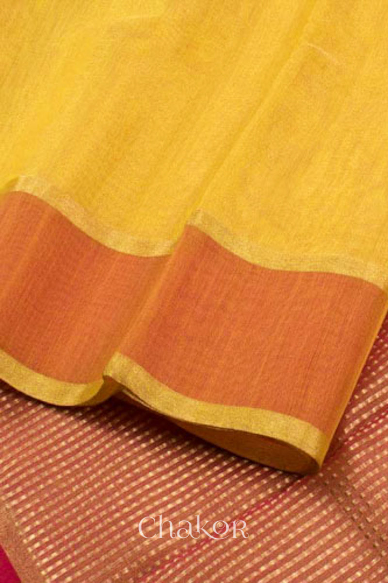 Chakor's Yellow Handlom Silk Cotton Saree with woven rust border and tissue pallu.