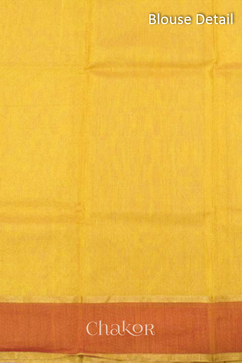 Chakor's Yellow Handlom Silk Cotton Saree with woven rust border and tissue pallu.