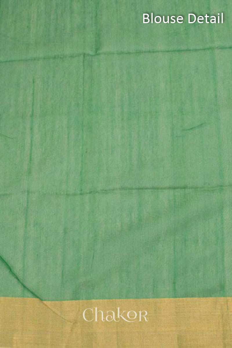 Chakor's Green Silk Cotton Saree with woven paisley buttis in zari.