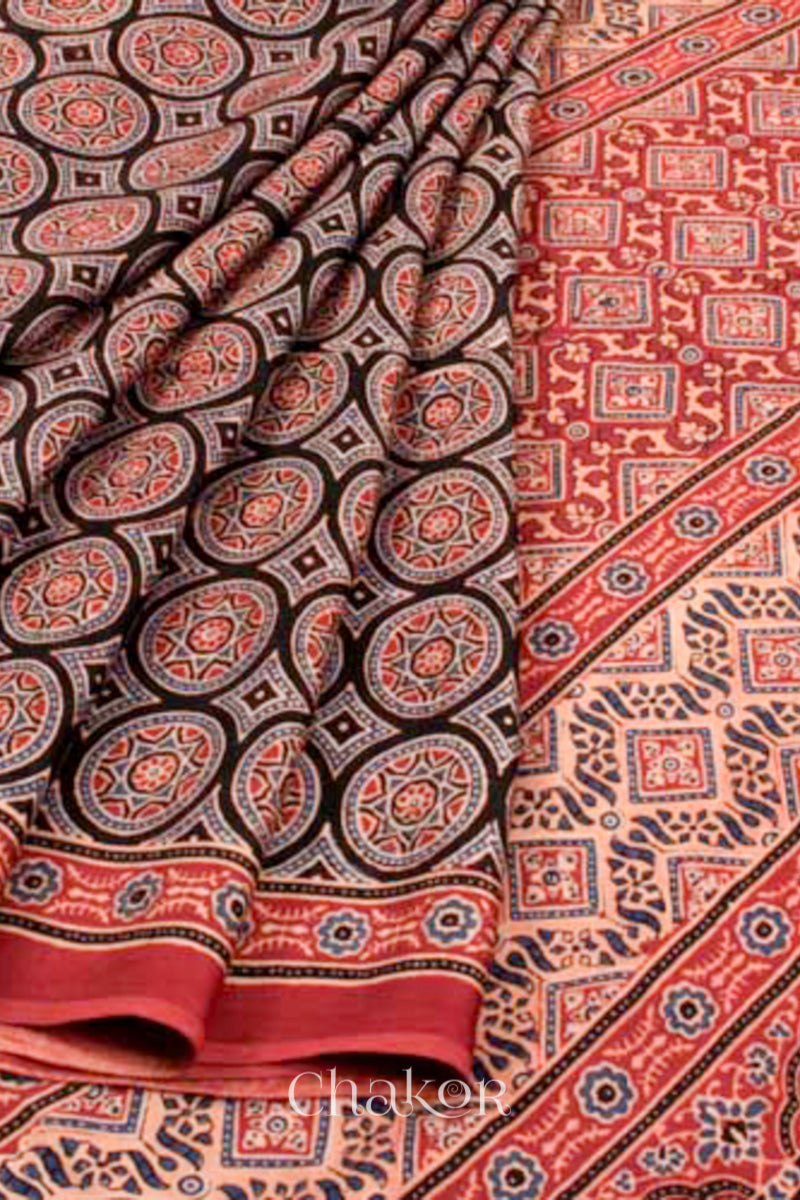 Close up of Natural Dyed Madder Red Ajrakh Printed Modal Cotton Saree Handcrafted in Kutch.