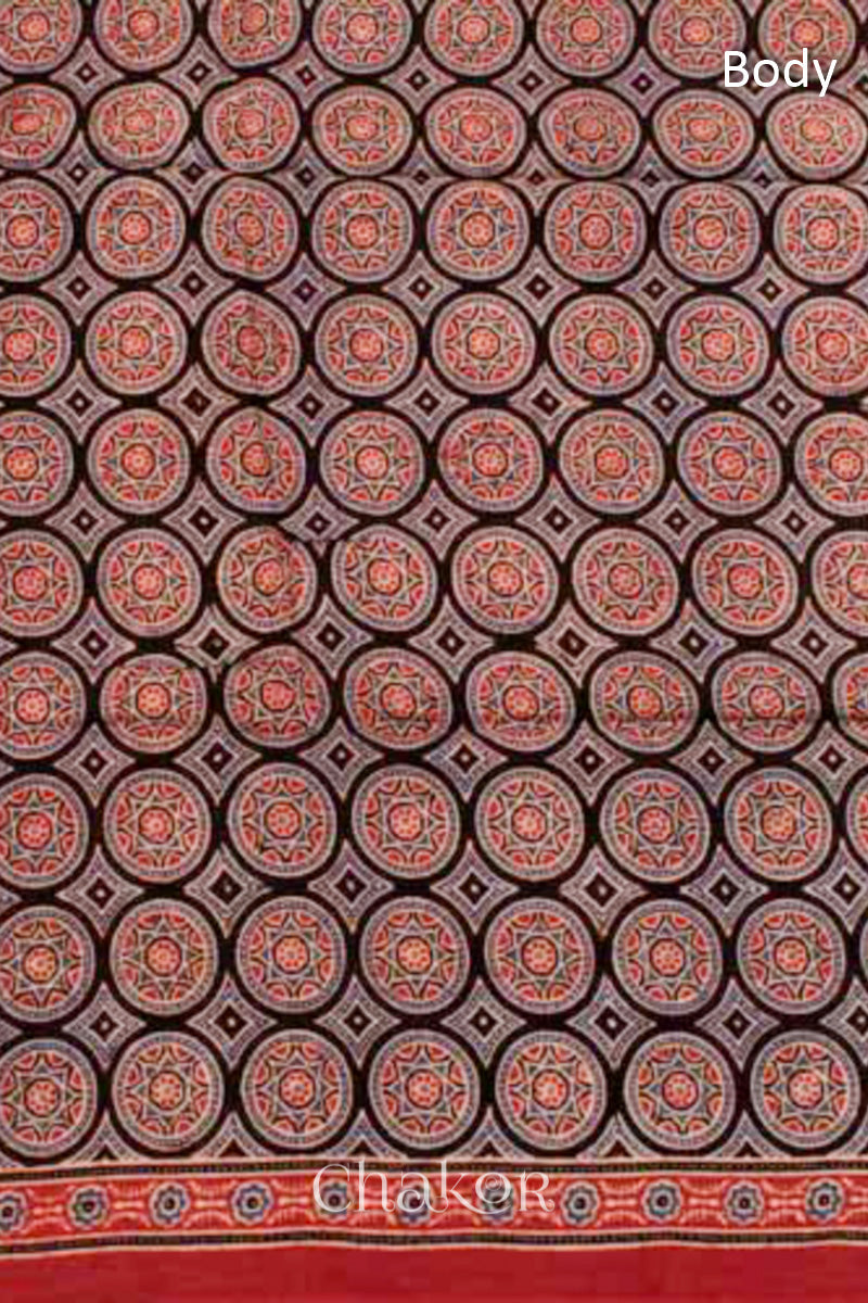 Close up of Natural Dyed Madder Red Ajrakh Printed Modal Cotton Saree Handcrafted in Kutch.