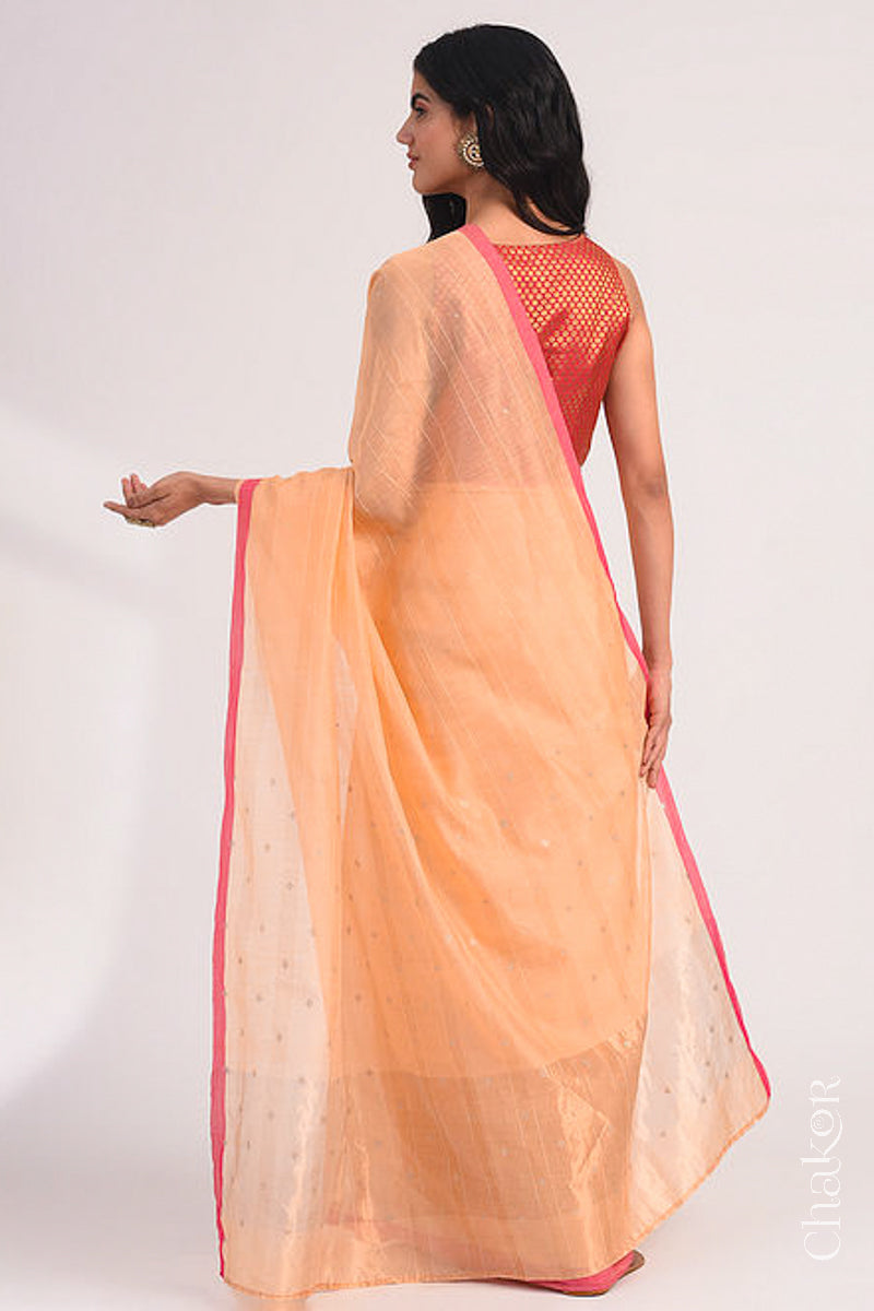 Chakor's Peach Handloom Silk Cotton Saree with woven fine zari stripes and embroidery.