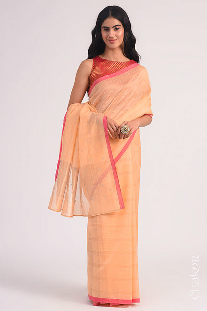 Chakor's Peach Handloom Silk Cotton Saree with woven fine zari stripes and embroidery.