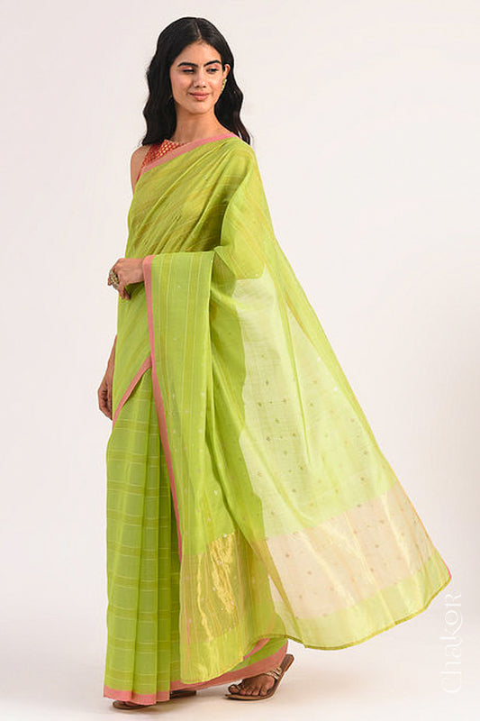 Model wearing Lime Green Chanderi Silk Cotton Saree with zari embroidery.