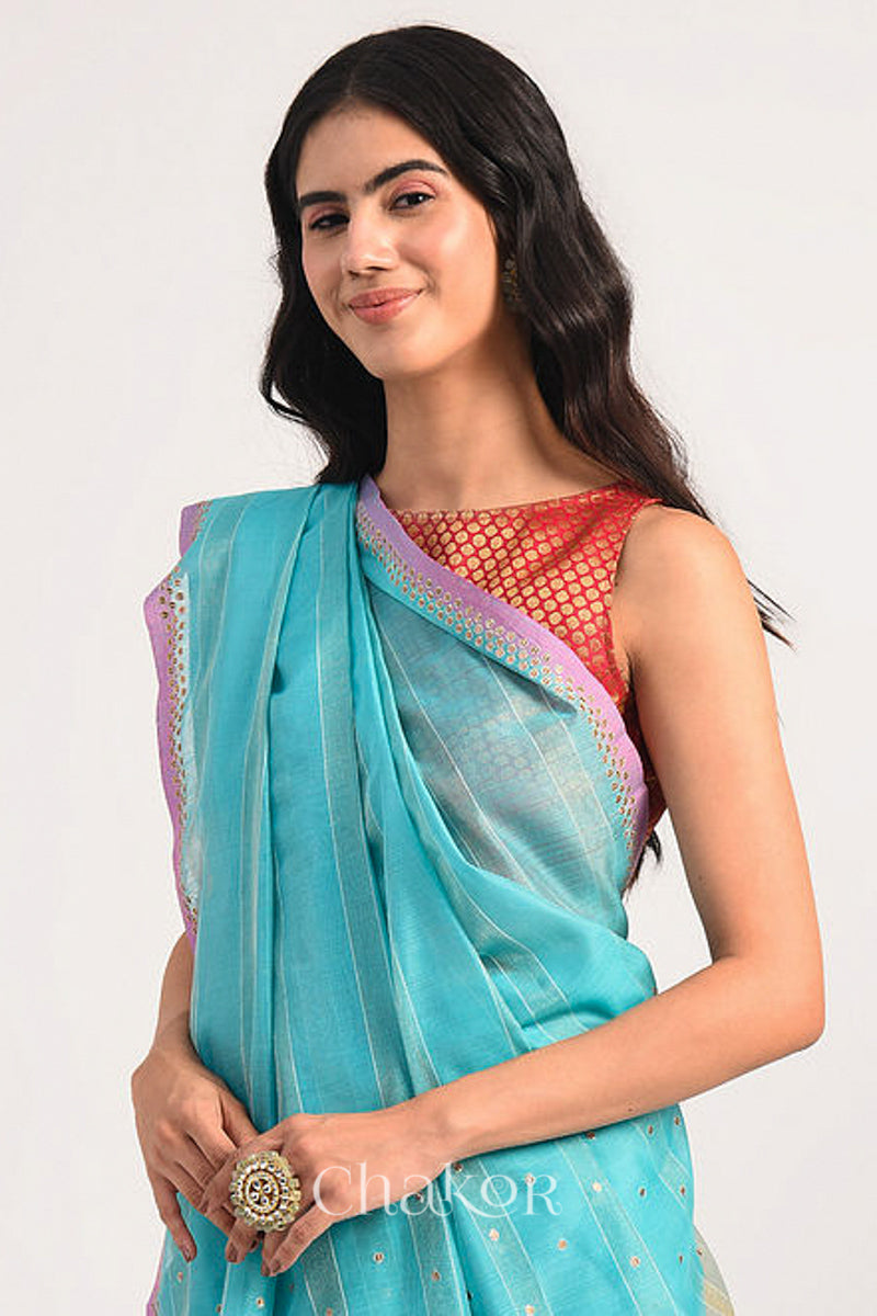 Chakor's Blue Handloom Silk Cotton Saree with woven fine zari stripes and embroidery.