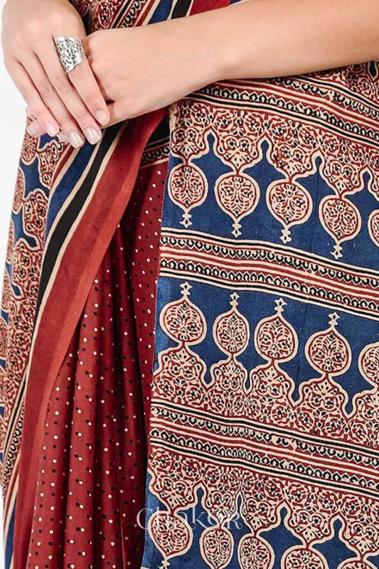 Woman Wearing Natural Dyed Madder Red Ajrakh Modal Saree Handcrafted in Kutch.