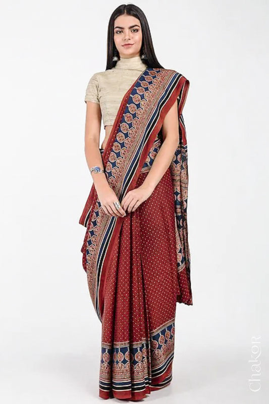 Woman Wearing Natural Dyed Madder Red Ajrakh Modal Saree Handcrafted in Kutch.