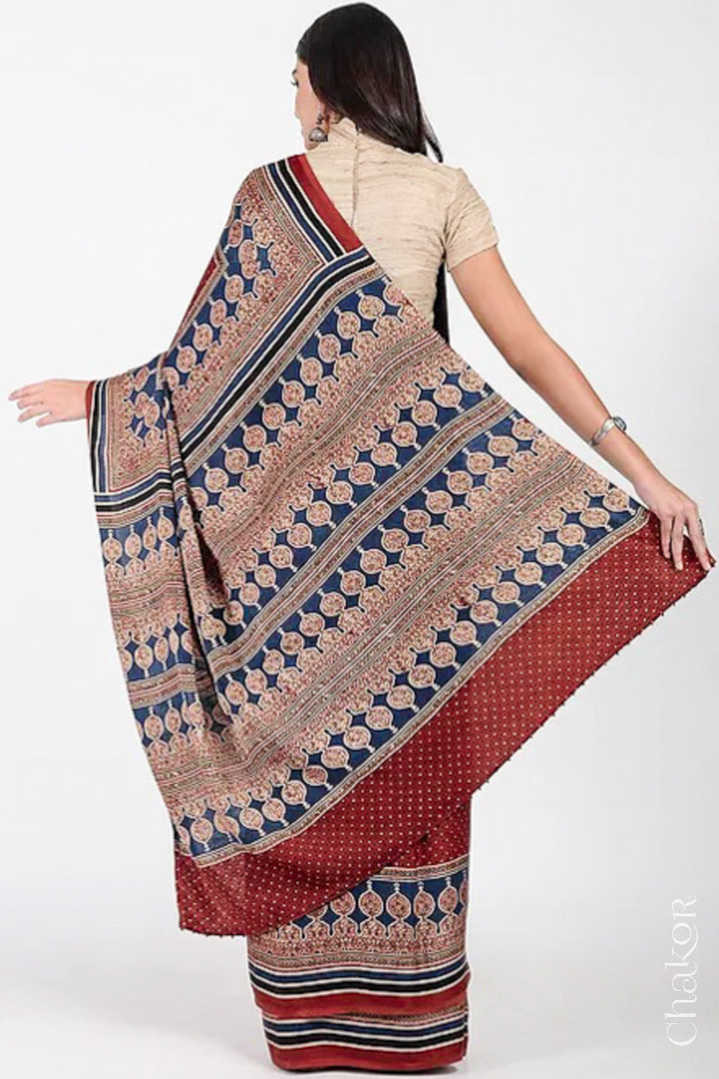 Woman Wearing Natural Dyed Madder Red Ajrakh Modal Saree Handcrafted in Kutch.
