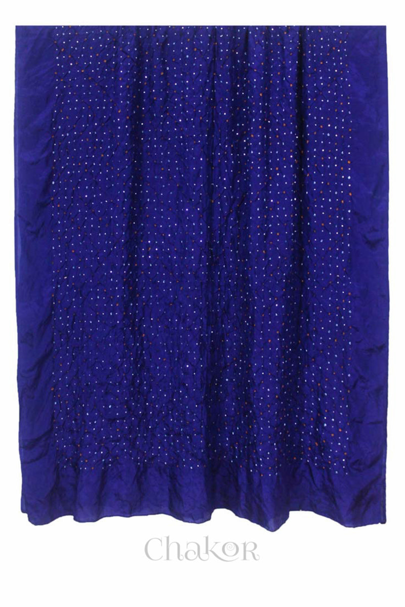 Full view of Navy Bandhani mulberry silk dupatta with tie-dye dot pattern & detailed with Mukaish work & Bead edging.
