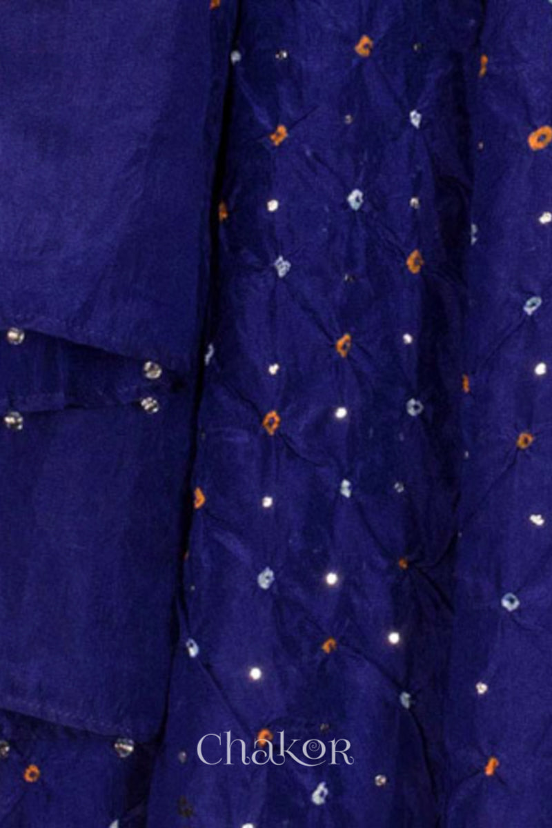 close-up of navy Bandhani mulberry silk dupatta with tie-dye dot pattern & detailed with Mukaish work & Bead edging.