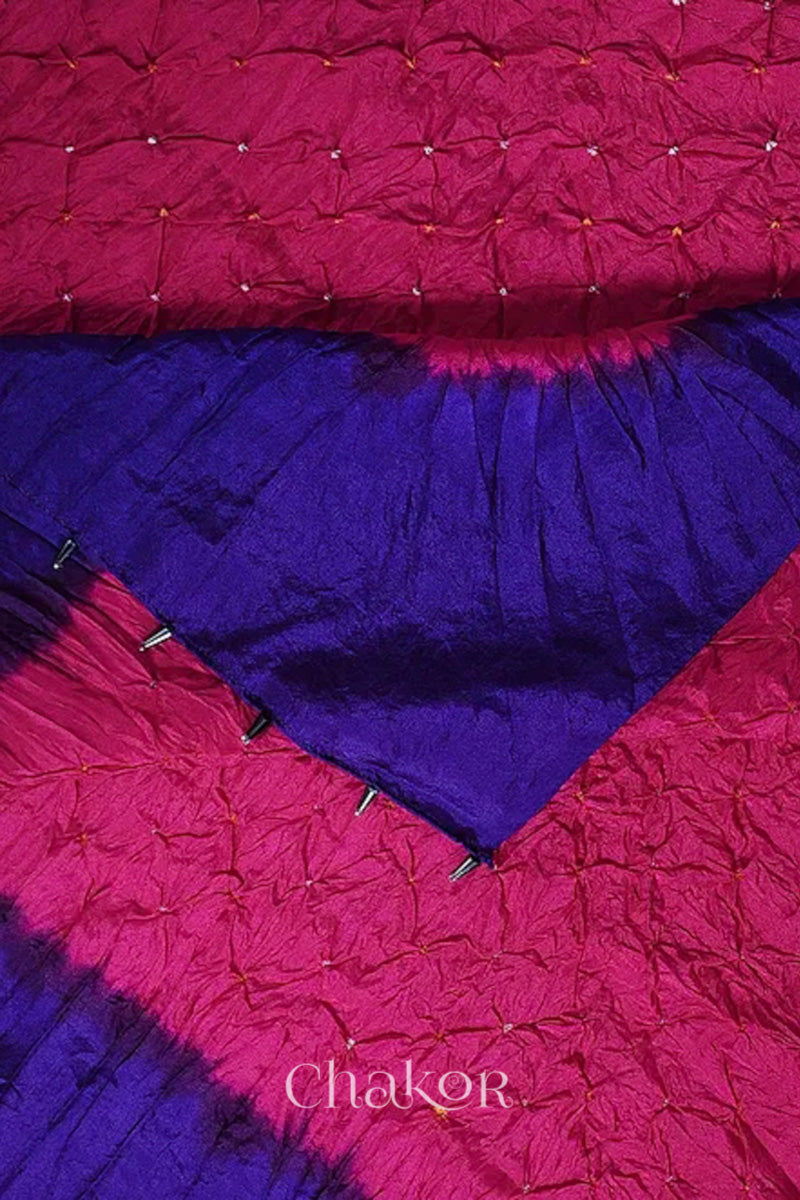 Close up of pink & purple border Bandhani mulberry silk dupatta with tie-dye dot pattern & detailed with Bead edging.
