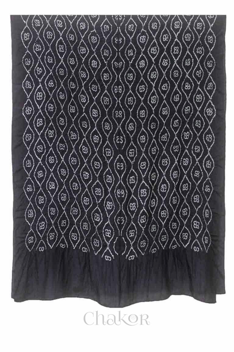 Full view of black Bandhani mulberry silk dupatta with tie-dye dot pattern & detailed with Bead edging.