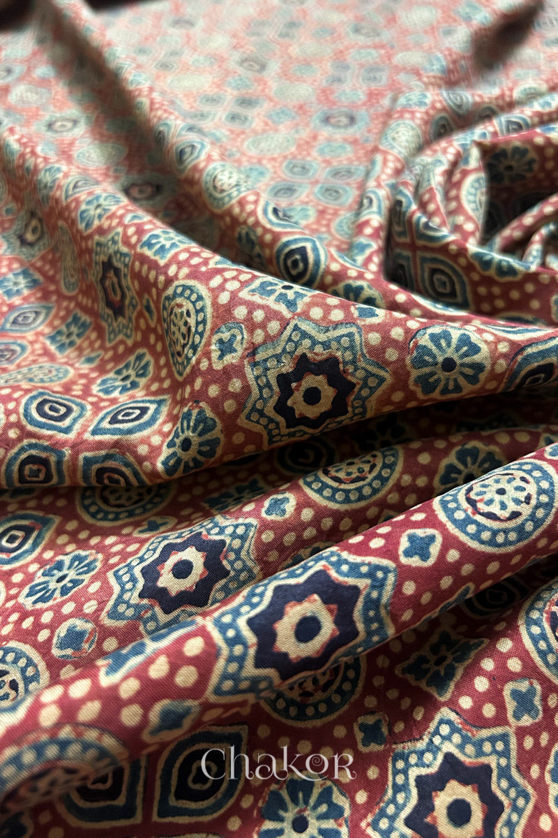 Heritage Ajrakh printing on lustrous pure Mulberry silk with Zari accents.
