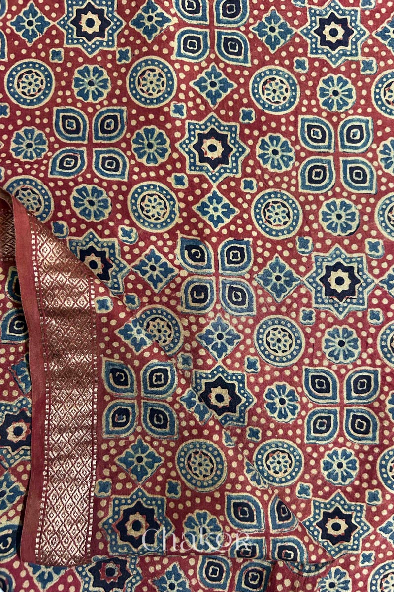 Blouse material in traditional red and indigo Ajrakh motifs on a premium woven silk base in  natural dyes.