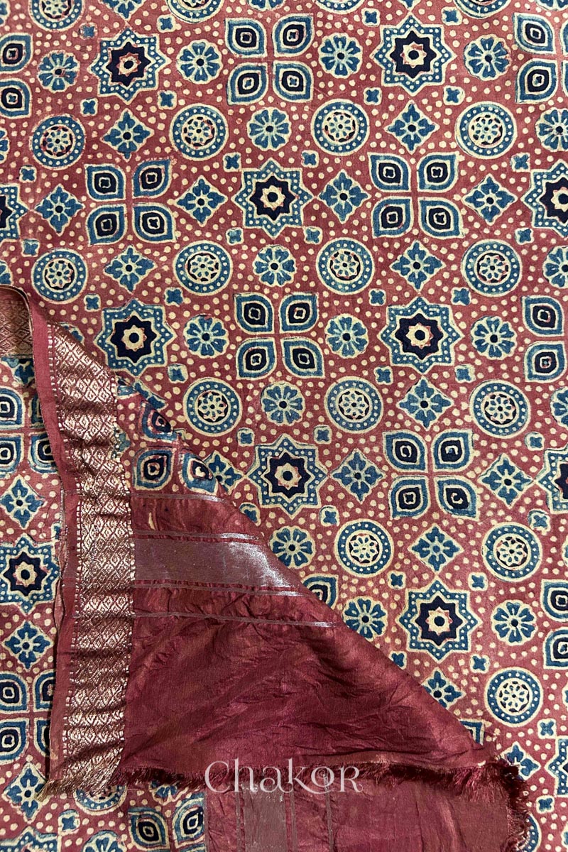 Handloom South silk blouse material featuring natural red Ajrakh prints.