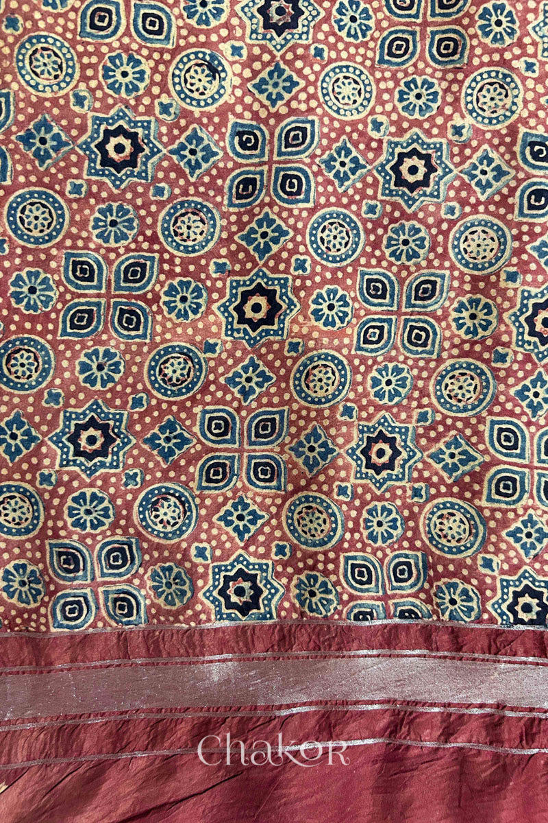 Handloom South silk blouse material featuring natural red Ajrakh prints.