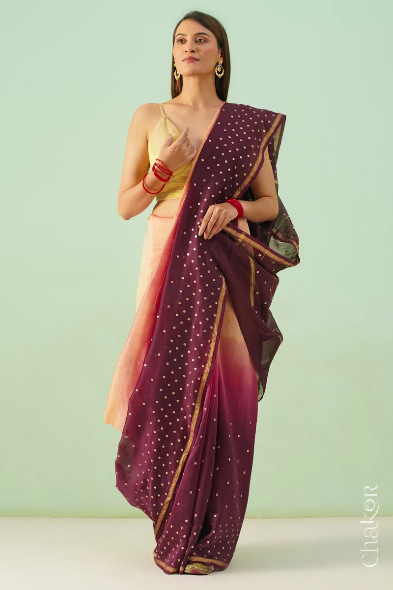 Full-length view of peach maroon shaded Chanderi silk cotton saree with ombre effect and tissue-striped pallu.
