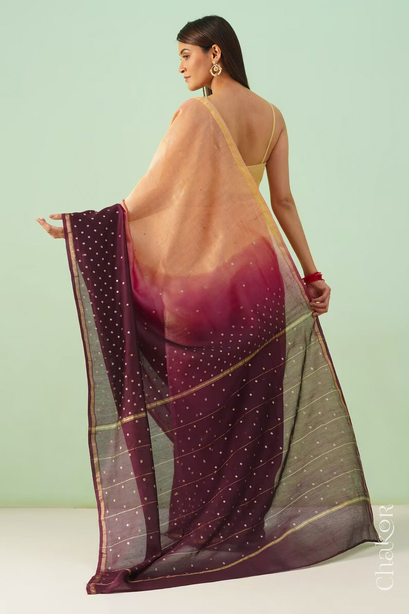 Back view of peach maroon shaded Chanderi silk cotton saree displaying ombre dyeing and tissue pallu.
