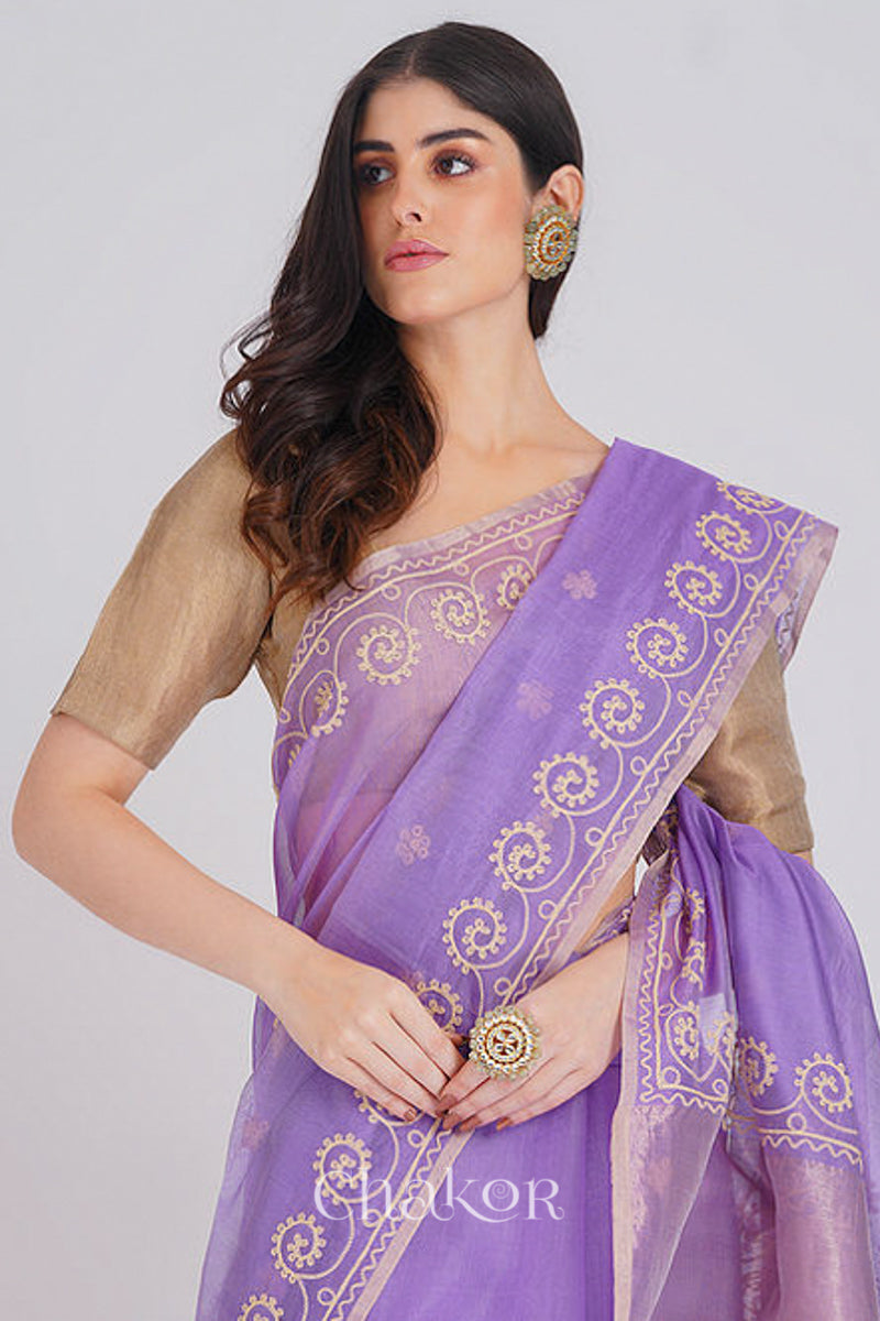 Front close view of lavender Chanderi silk cotton saree highlighting aari embroidery details.
