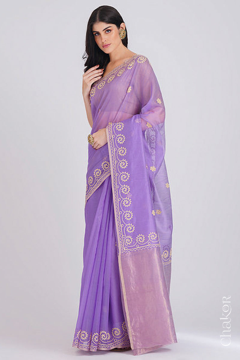 Full-length view of lavender Chanderi silk cotton saree draped to show handloom texture and embroidery.
