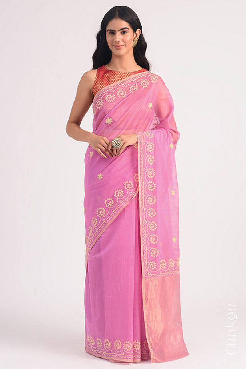 Full-length view of pink Chanderi silk cotton saree draped to show handloom texture and embroidery.

