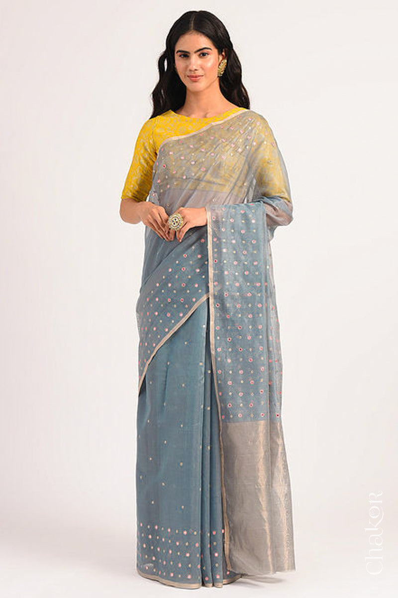 Chakor's Grey Handloom Silk Cotton Saree with woven tissue pallu & delicate mirror & sequin work buttis.
