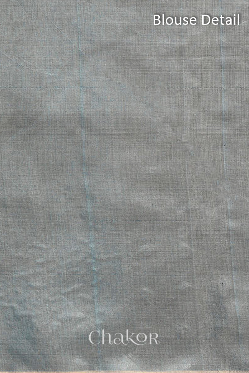 Chakor's Grey Handloom Silk Cotton Saree with woven tissue pallu & delicate mirror & sequin work buttis.