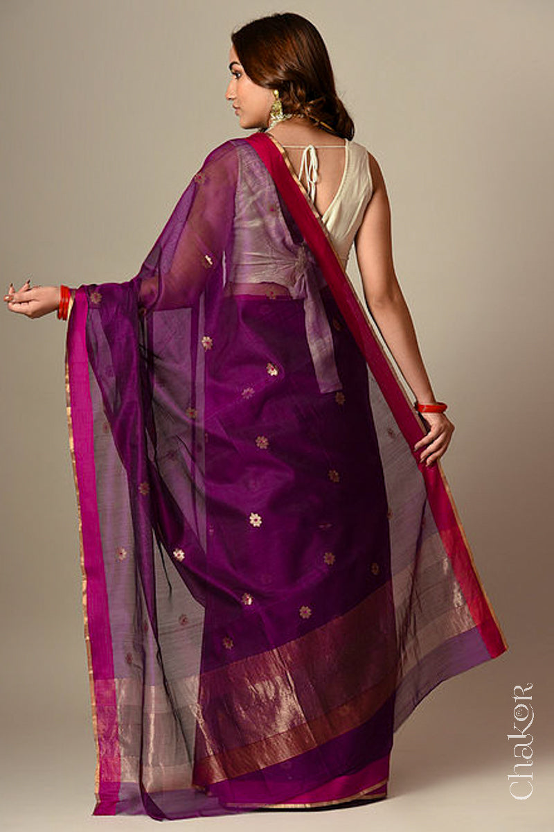 Back view of model wearing Magenta Chanderi silk cotton saree with tissue-striped pallu displayed.
