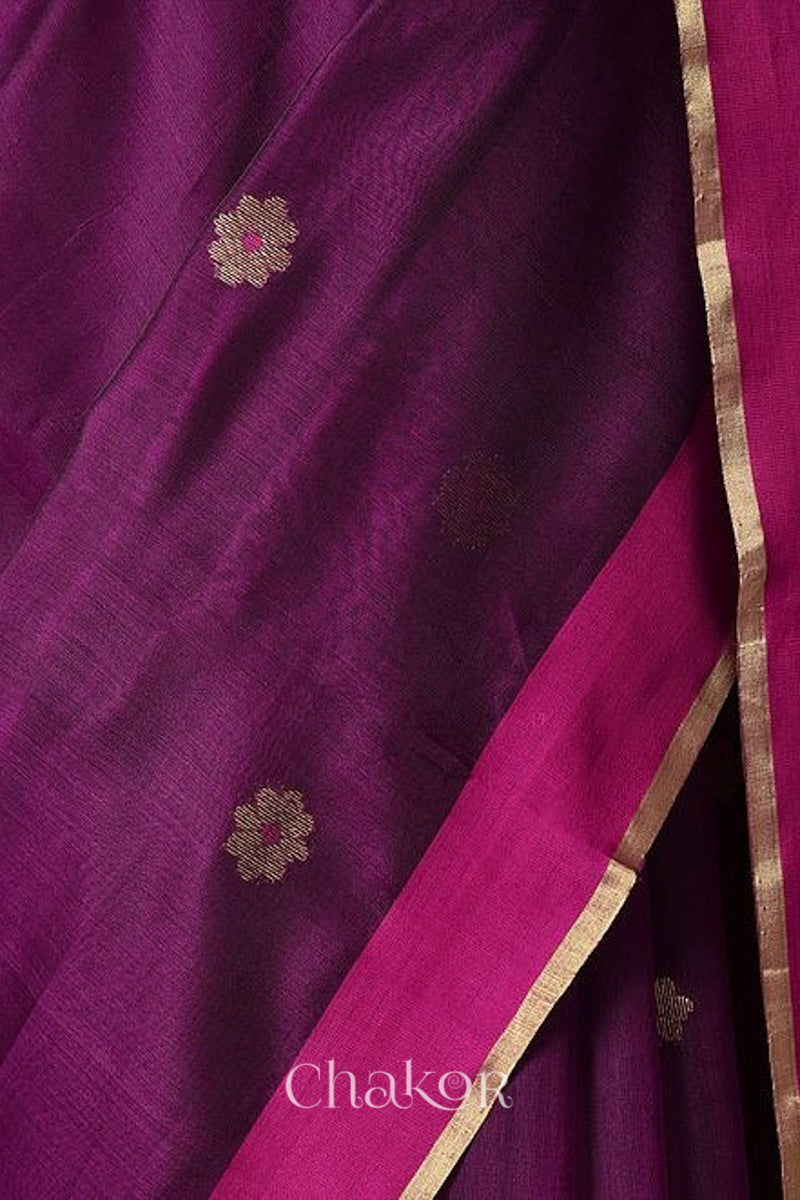 Close-up of Ganga Jamuna border and phool butti weave on Magenta Chanderi silk cotton fabric.
