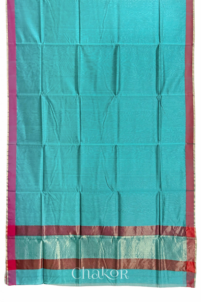 Full view of the Sea Blue Chanderi silk cotton saree, showing both ganga jamuna border and tissue pallu.
