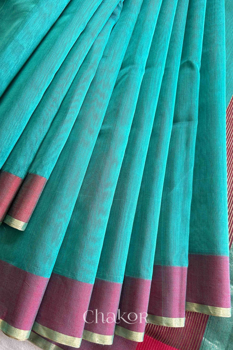Detail of Ganga Jamuna borders woven with zari on Handloom Sea Blue Chanderi silk cotton saree.
