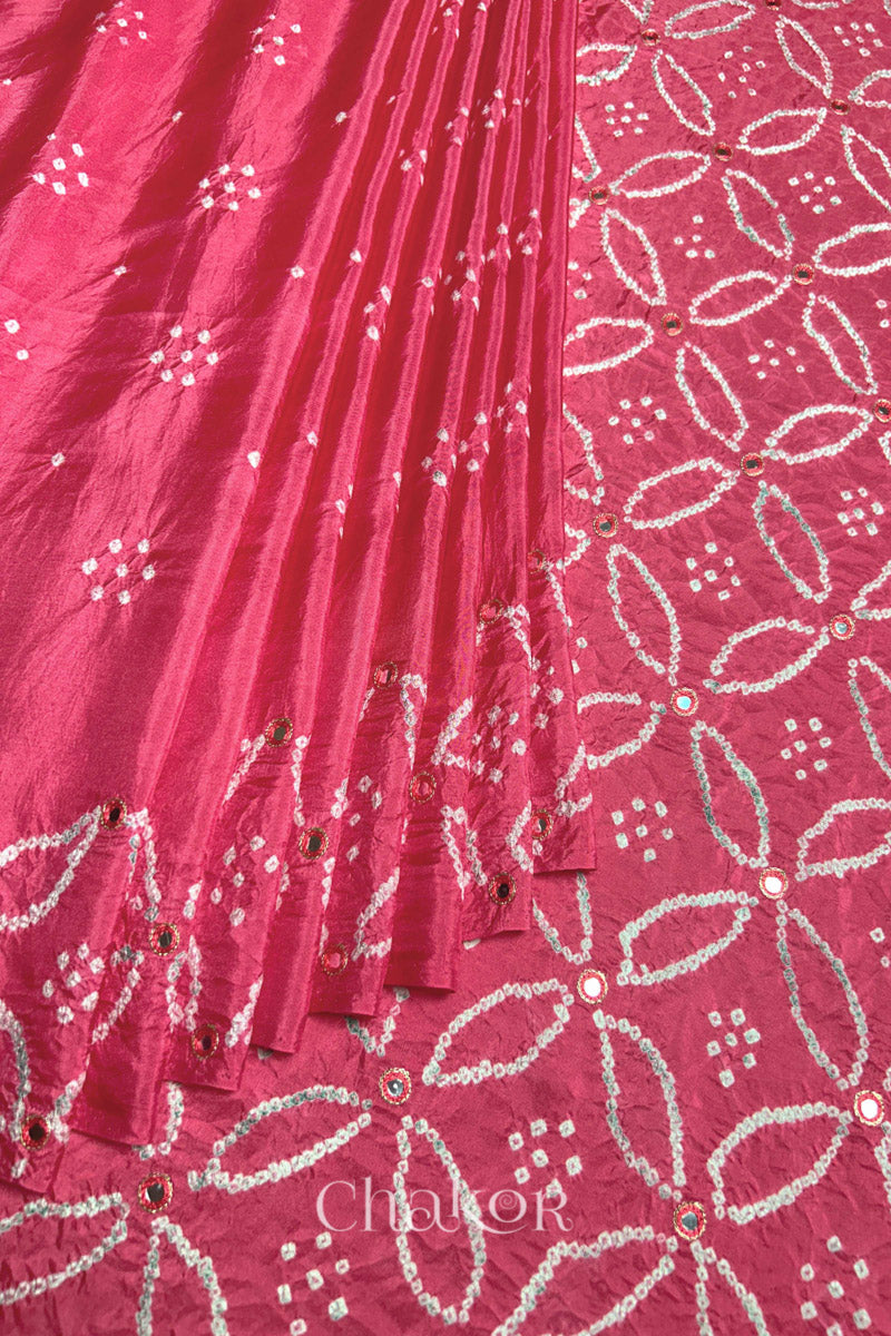 Pleated view of Strawberry Pink Bandhani Mulberry Silk Saree with mirror embroidery.