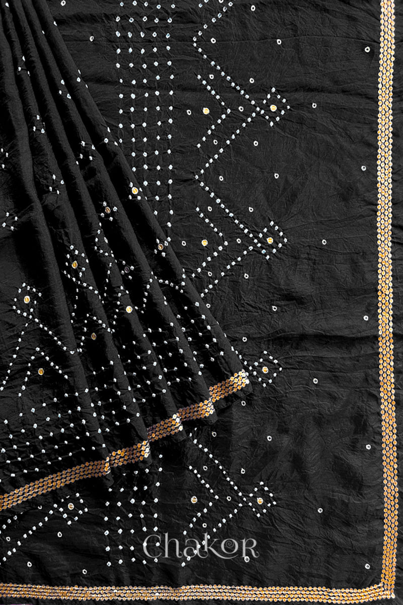Pleated view of Black Bandhani Mulberry Silk Saree with sequins embroidery.