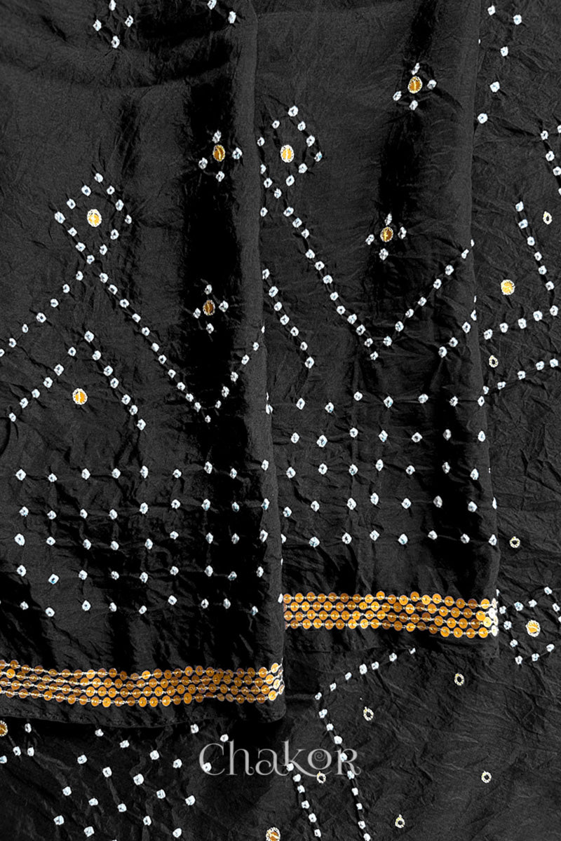 Close up of Black Bandhani Mulberry Silk Saree with sequins embroidery.