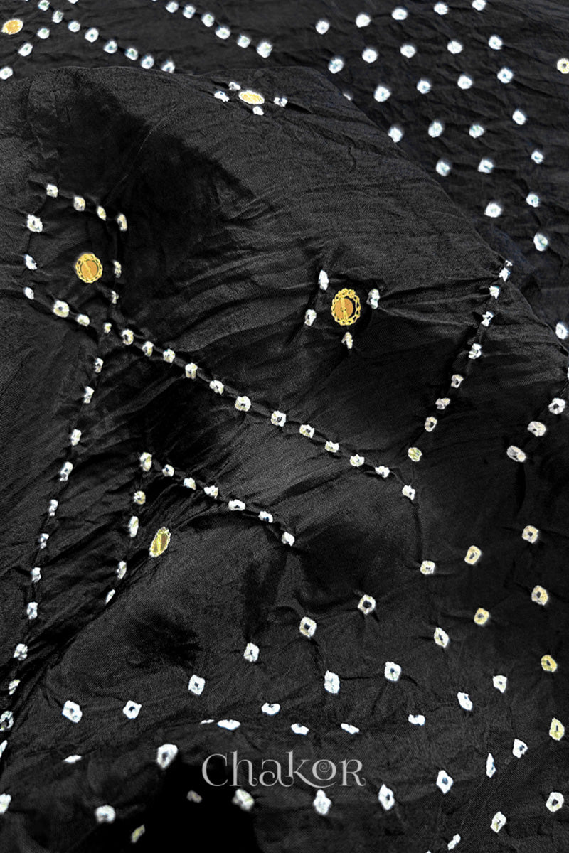 Close up of Black Bandhani Mulberry Silk Saree with sequins embroidery.