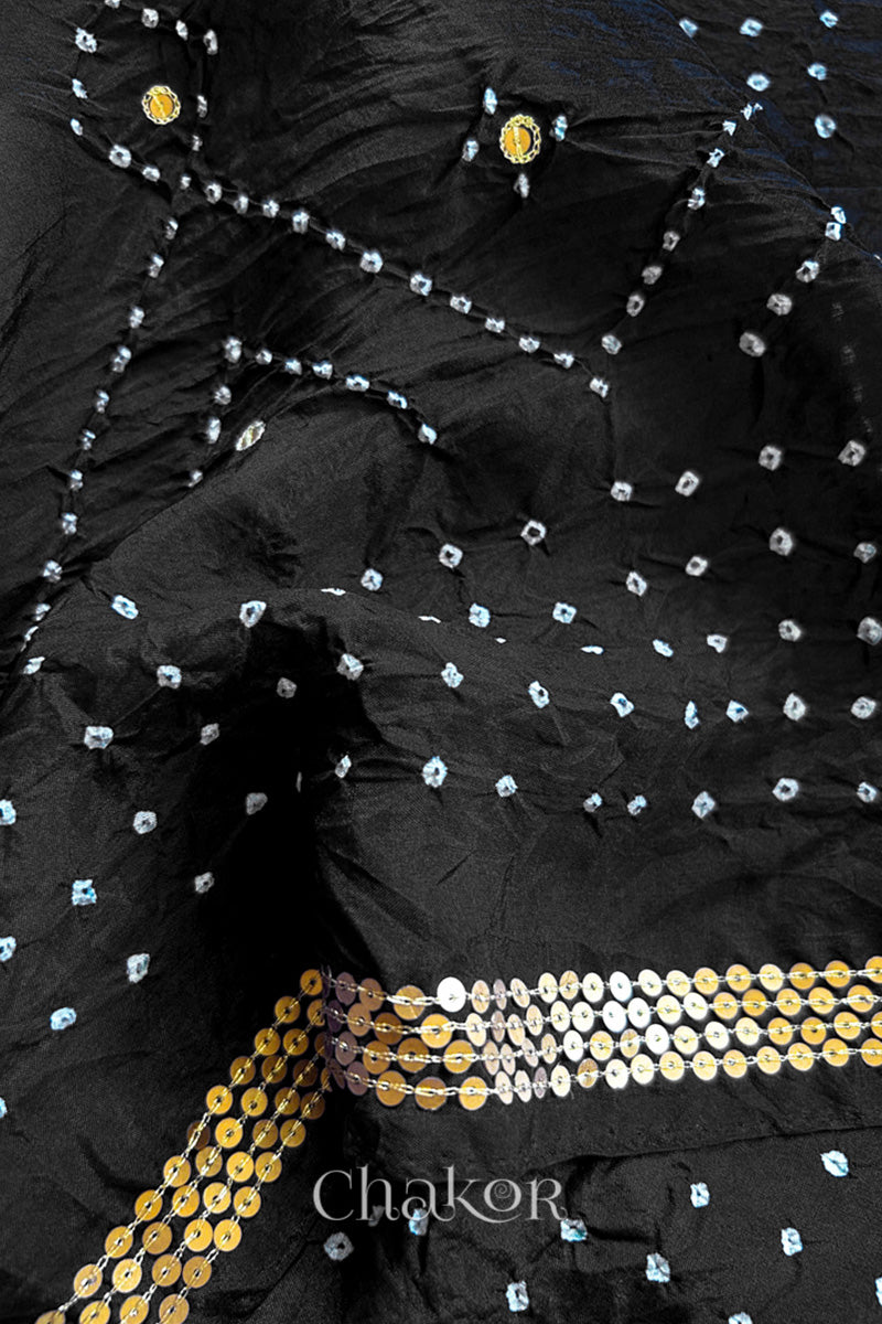Close up of Black Bandhani Mulberry Silk Saree with sequins embroidery.