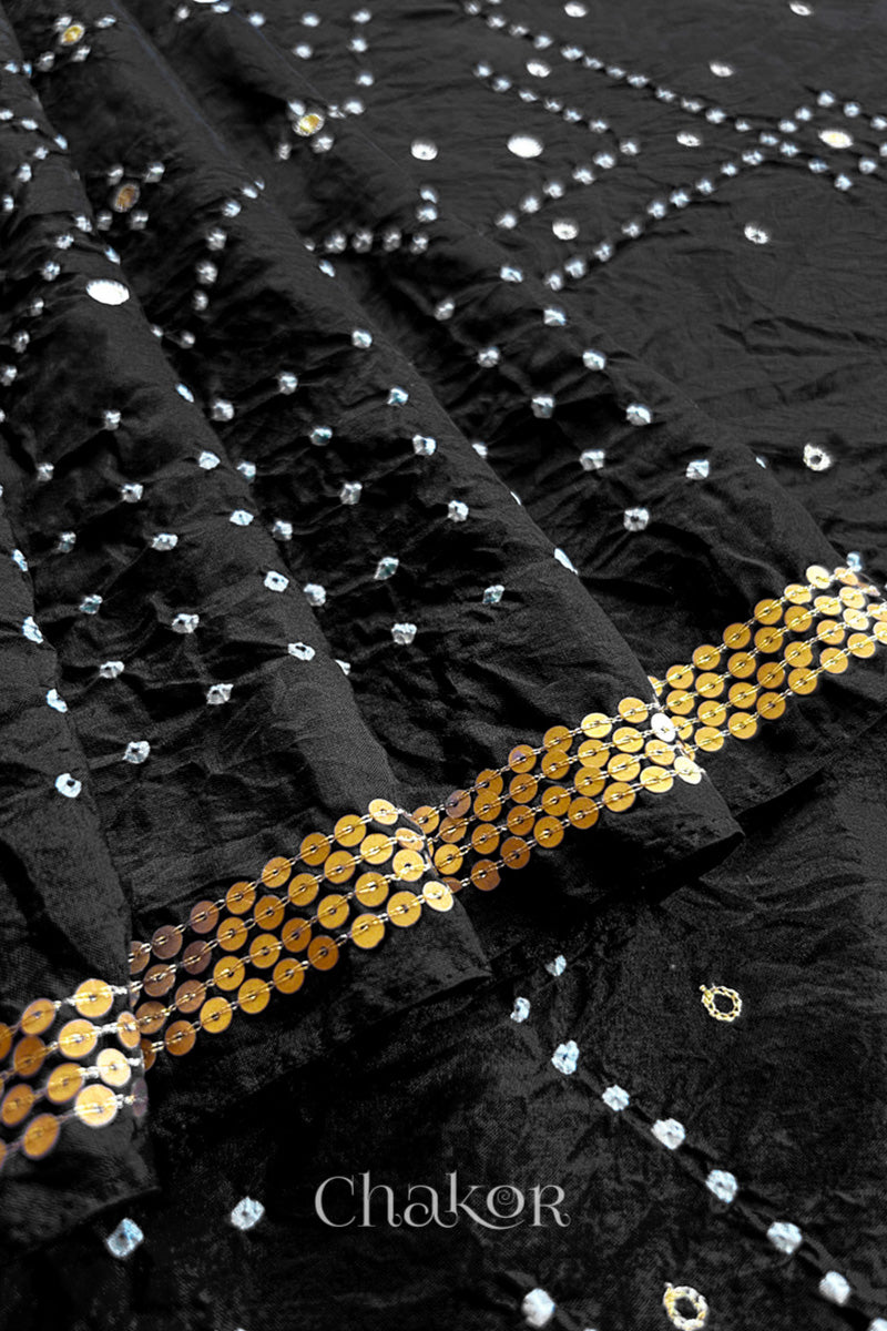 Close up of Black Bandhani Mulberry Silk Saree with sequins embroidery.
