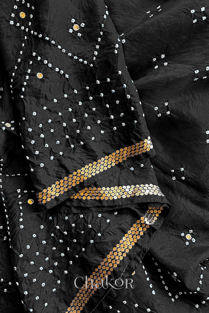 Close up of Black Bandhani Mulberry Silk Saree with sequins embroidery.