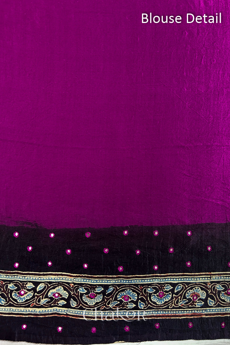 Blouse Material of Magenta Bandhani Saree with Black Ajrakh printed border and pallu in pure gaji silk with traditional bandhej tie-dye & mirror work, handcrafted in Kutch. 